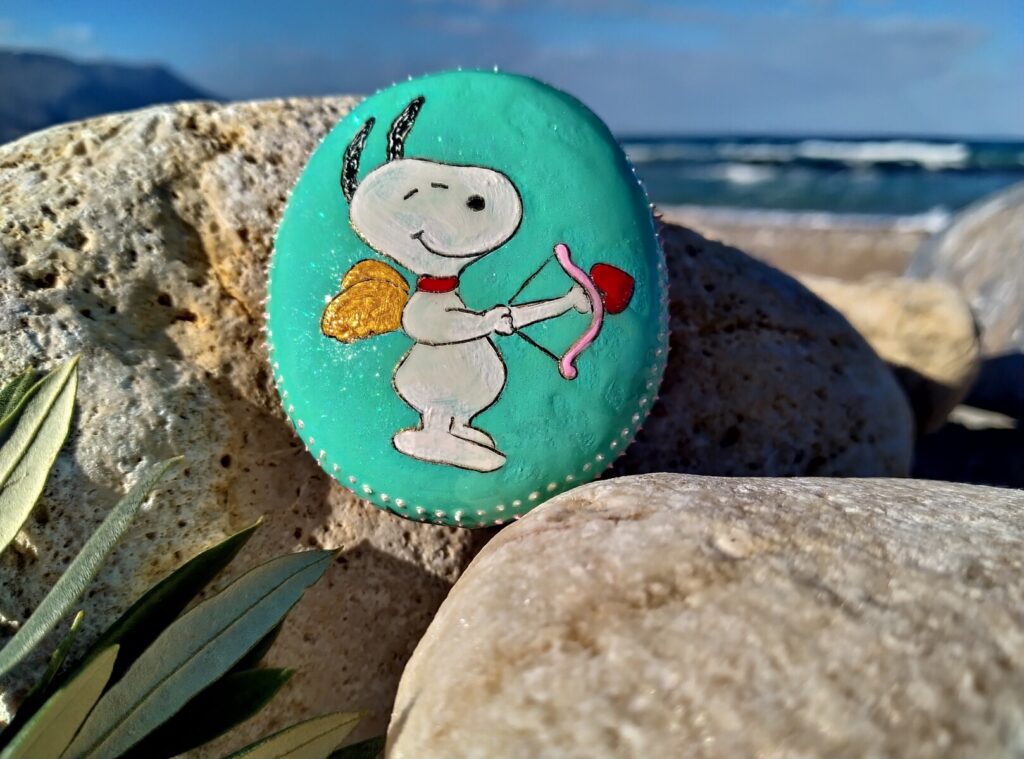 Snoopy painted on stone from kissamos beach
