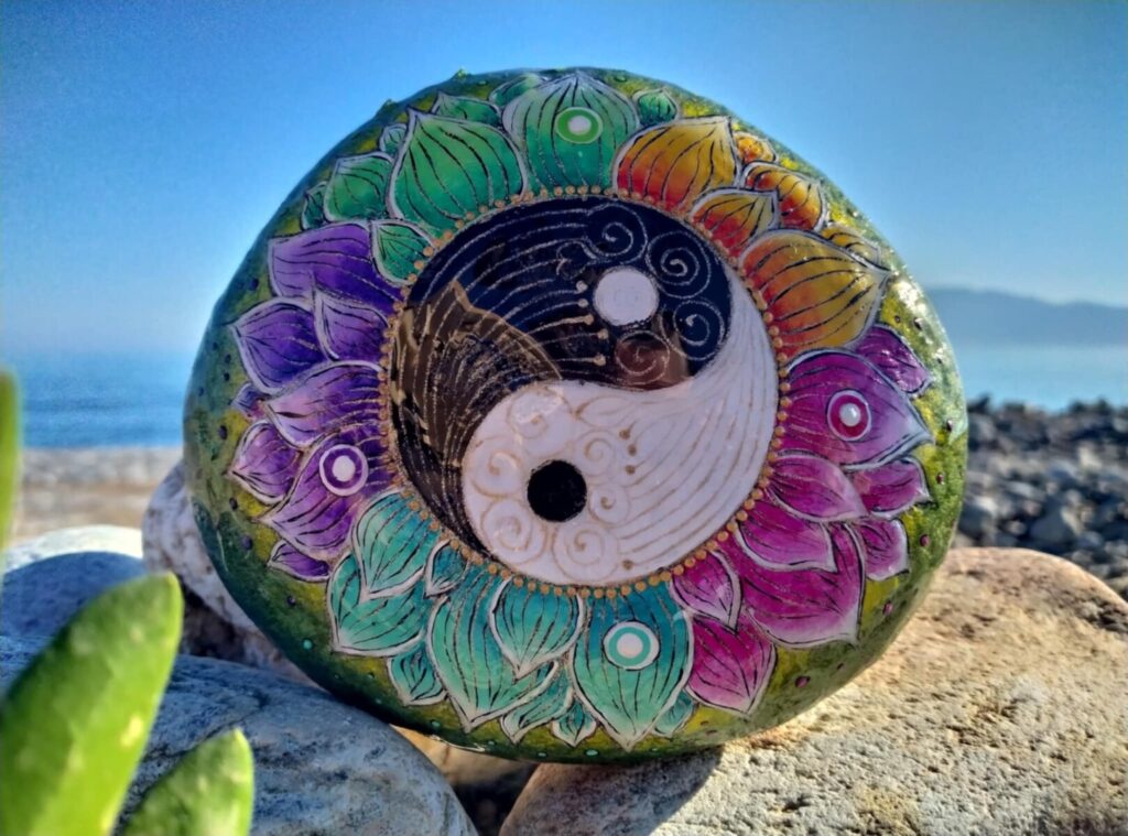yin yang-symbols-colrful-hand-painted- sea stone