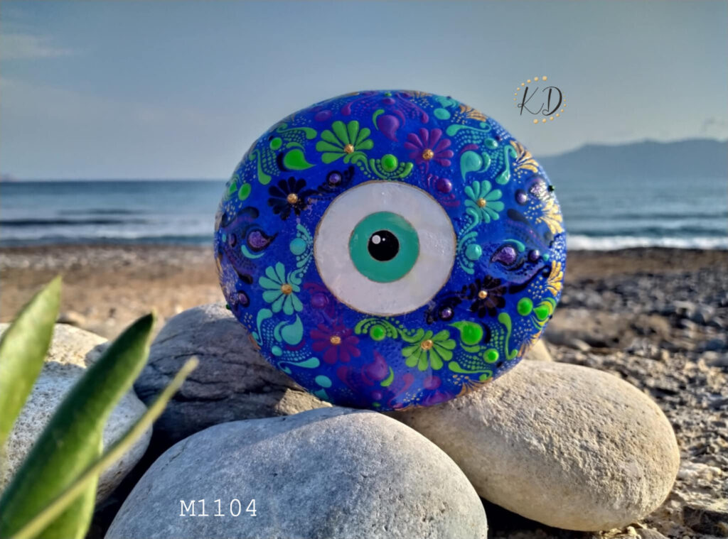 Decorative stone with evil eye design.